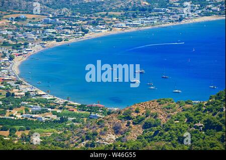 Beautiful beach with sea in tourist resort. Greece island Kos. Beautiful concept for summer vacation. Natural colorful background. Stock Photo