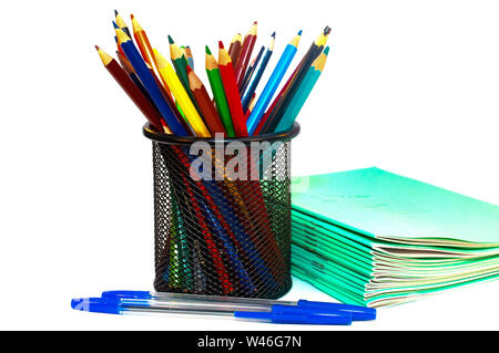 Color pencils and notebooks for school isolated on white background Stock Photo