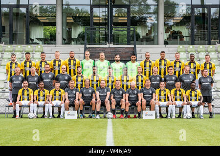 ARNHEM, 17-07-2019, Dutch football, Eredivisie, Papendal, season 2019 / 2020, photocall Vitesse, back row (L-R): Matus Bero, Armando Obispo, Oussama Darfalou, Rasmus Thelander, Jay-Roy Grot, Jeroen Houwen, Remko Pasveer, Kostas Lamprou, Bilal Bayazit, Tim Matavz, Danilho Doekhi, Tomas Hajek, Riechedly Bazoer, Julian Lelieveld Middle row (L-R): Chris van Dee (kit man), Mirjam Clifford (team manager), Jesper Gabri‘ls (physiotherapist), Kevin Balvers (video-analist), Oussama Tannane, Mukhtar Ali, Thomas Buitink, Richie Musaba, Max Clark, Jan van Norel (physical coach), Pieter Sengkerij (club doct Stock Photo