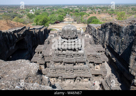 India, Maharashtra, Ellora, Ellora Caves. Overview looking down on the top of Cave 16, The Kailasa Temple aka Kailasanatha, entirely carved out of one Stock Photo