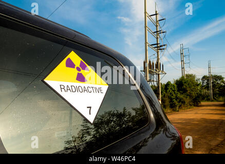 Radiation warning sign on the Hazardous materials transport label Class 7 at the transport truck Stock Photo