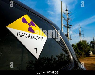 Radiation warning sign on the Hazardous materials transport label Class 7 at the transport truck Stock Photo