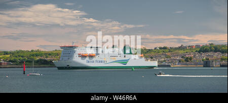 Irish Ferries Isle of Inishmore leaving Pembroke Dock in Pembrokeshire, Wales, UK on a summer day Stock Photo
