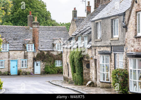 The attractive village of Corfe Castle, Dorset, England, UK Stock Photo