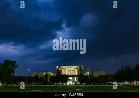 Berlin, Germany. 11th June, 2019. Dark clouds hang over the Federal Chancellery. Credit: Paul Zinken/dpa/Alamy Live News Stock Photo