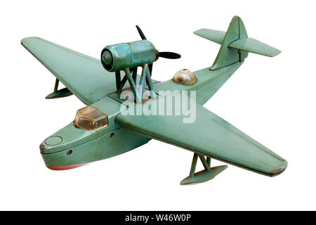 Isolated objects: old generic hydro aeroplane green metal scale model, isolated on white background Stock Photo