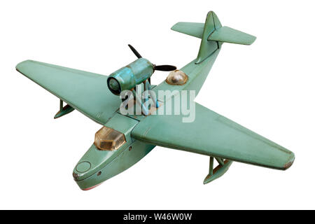 Isolated objects: old generic hydro aeroplane green metal scale model, isolated on white background Stock Photo