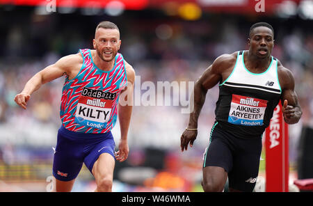 Great Britain's Richard Kilty (left) and Harry Aikines-Aryeetey in the Men's 100m heat 2 during day one of the IAAF London Diamond League meet at the London Stadium. Stock Photo