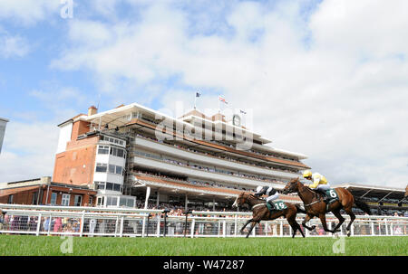 Silvestre de Sousa on board Bettys Hope (left) wins the Weatherbys Super Sprint Stakes from Paddy Mathers on board Show Me Show Me at Newbury Racecourse. Stock Photo