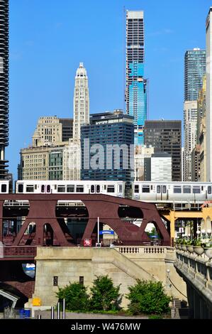 Chicago, Illinois, USA. A segment of the city  skyline that rises along and above the south bank of the Chicago River in downtown Chicago. Stock Photo