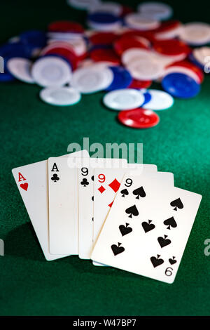 Five Card Stud Poker Hand,Full House, Aces and Nines Stock Photo