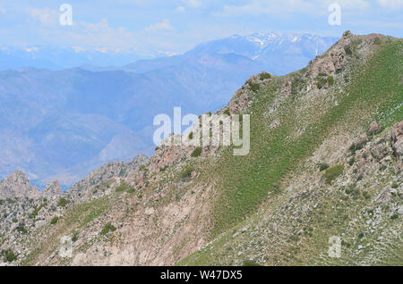 Climb of Greater Chingam peak, Ugam-Chatkal National Park, Uzbekistan Stock Photo