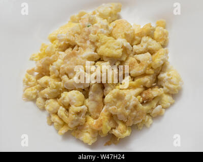 Stir Fry Egg served in a white background Stock Photo