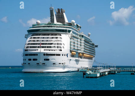 The cruise liner moored to the pier in Ocho Rios resort town (Jamaica). Stock Photo