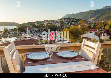 Cozy outdoor cafe at sunset in Kas, Mediterranean coast, Turkey Stock Photo