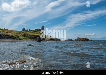 Dunure Rugged sea defences, its ancient castle ruins and now also an ‘Outlander’ filming location attracting  much needed attention to the village dur Stock Photo