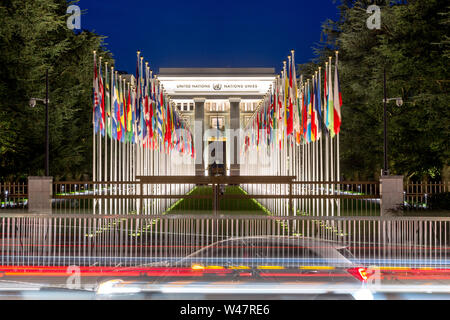 The United Nations member states flags in front of the United Nations Office in Geneva in the background. Palace of Nations, Geneva, Switzerland Stock Photo