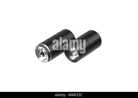 Black silencer for weapons. Suppressor that is at the end of an assault rifle. Stock Photo