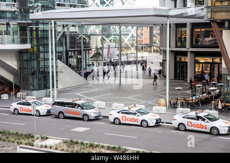 Sydney taxis wait for fares at Barangaroo office development in Sydney city centre,Australia Stock Photo