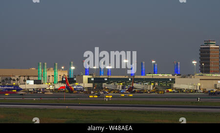 Los Angeles International Airport, LAX, Terminal 1 at dusk. Southwest Airlines operates from Terminal 1. Stock Photo