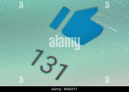 BUENOS AIRES, ARGENTINA - JULY 19, 2019: Dislike button on YouTube app on mobile phone touch screen (Android device) with the number 2 below. Macro sh Stock Photo