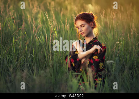 outdoors portrait of beautiful young woman Stock Photo