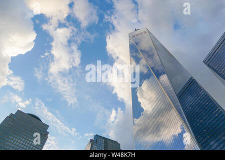 Freedom Tower, also known as One World Trade Center, with blue sky and clouds