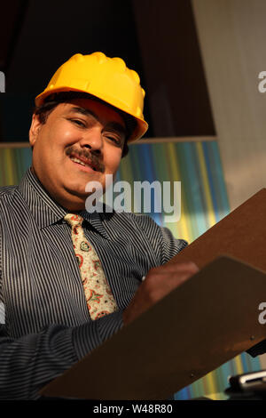 Architect doing paperwork Stock Photo