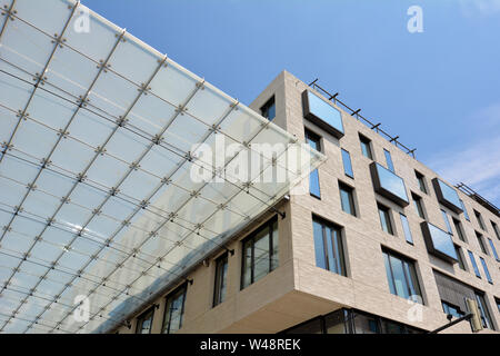 Mannheim, Germany - July 2019: Glass roof connecting buildings of big shopping center called 'Q6 Q7' in Mannheim city Stock Photo