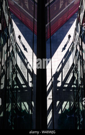 Reflections in art of the new futuristic wing designed by architect Jean Nouvel at the Centro de Arte Reina Sofia in Madrid, Spain Stock Photo