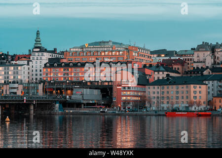 Editorial 27.03.2019 Stockholm Sweden Hilton hotel near Slussen after sunset with the lights turned on Stock Photo