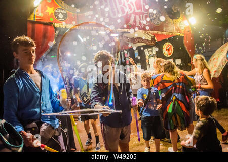 Henham Park, Suffolk, UK. 21st July 2019.Bubbles Inc entertains late into the night. The 2019 Latitude Festival. Credit: Guy Bell/Alamy Live News Stock Photo