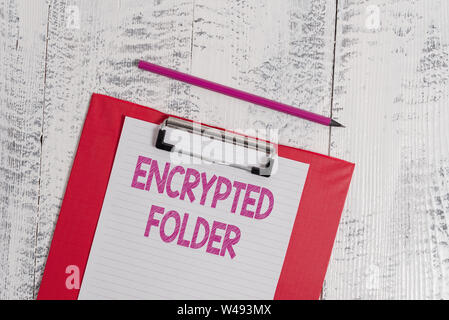 Handwriting text Encrypted Folder. Conceptual photo protect confidential data from attackers with access Colored clipboard blank paper sheet pencil ol Stock Photo