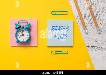 Conceptual hand writing showing Scientific Method. Concept meaning Principles Procedures for the logical hunt of knowledge Notepads colored paper shee Stock Photo