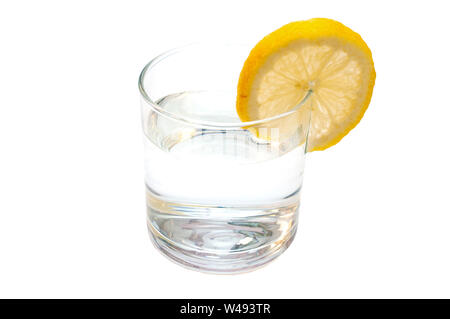 Glass of pure water with lemon isolated on a white background Stock Photo