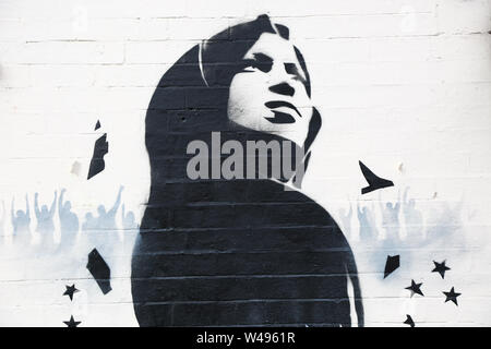 Ilhan Omar mural or graffiti art on a wall, Birmingham, Small Heath, UK Stock Photo