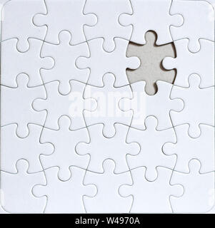 blank jigsaw puzzle with missing puzzle piece Stock Photo