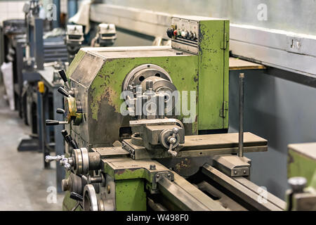 A lathe machine in a well-organized industrial workshop Stock Photo