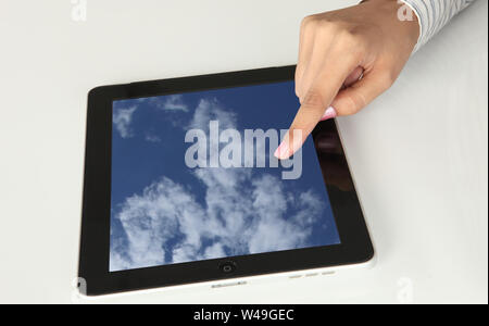 Close up of a person hand using a digital tablet Stock Photo