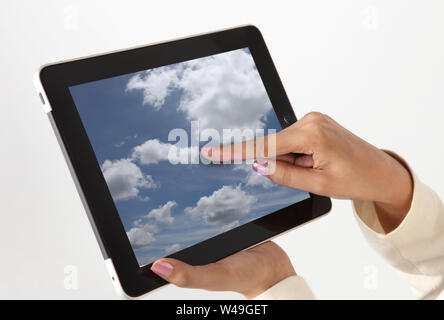 Close up of a person hand using a digital tablet Stock Photo