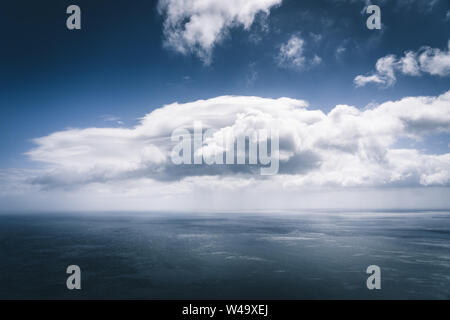 Wuiet sea views with white cloud and storm approaching over Atlantic Ocean. Blue sky relaxing concept,beautiful tropical background for travel Stock Photo