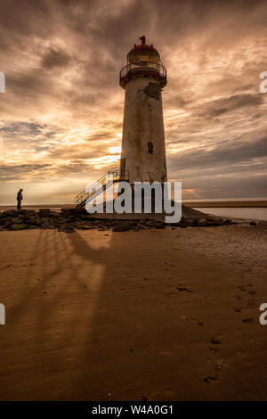 Sunset at the Point of Ayr Lighthouse at Talacre Beach, Prestatyn North Wales UK Stock Photo