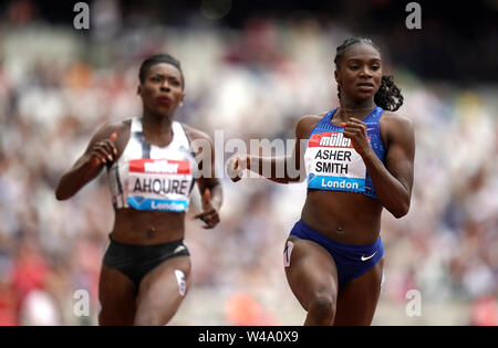 Great Britain's Dina Asher-Smith (right) finishes second in the Women's 100m alongside Ivory Coast's Murielle Ahoure in sixth during day two of the IAAF London Diamond League meet at the London Stadium. Stock Photo