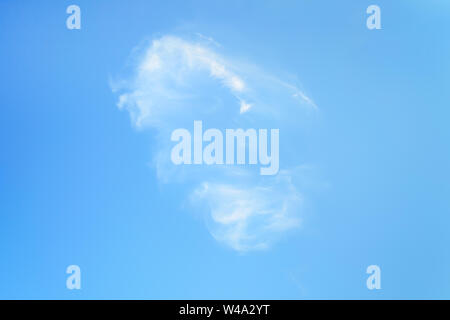 Single white translucent cirrus cloud high in the blue summer sky. Different cloud types and atmospheric phenomena. Skyscape on a sunny day. Stock Photo