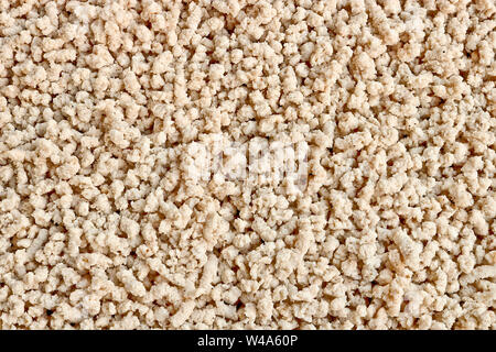 Culinary Texture - ground chicken mince. Ready meal. Milled boiled meat. Stock Photo