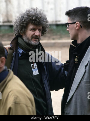 17th April 1993 During the Siege of Sarajevo: John F. Burns of the New York Times talks with French journalist, Paul Marchand, at Sarajevo Airport where the Bosnian Serbs and Muslims were meeting for talks. Stock Photo