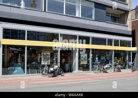 ANWB winkel in Leiden, The Netherlands. The Royal Dutch Touring Club (ANWB) operates 87 shops selling documents, leisure and travel products Stock Photo -