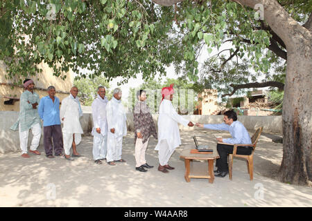 Rural people getting money Stock Photo