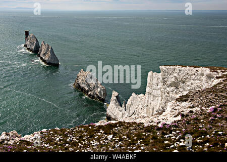 The Needles, a row of three chalk stacks close to Alum Bay, and part of Totland, the westernmost parish of the Isle of Wight, UK Stock Photo