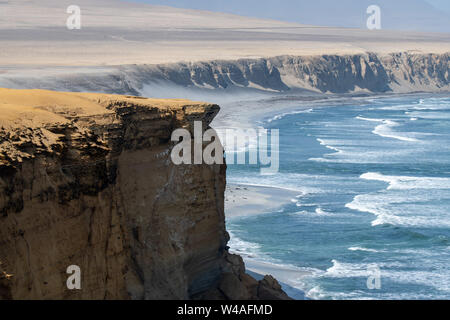 Red sand beach (Playa roja) in Paracas National Reserve in Southern Peru on the Paracas Peninsula Stock Photo